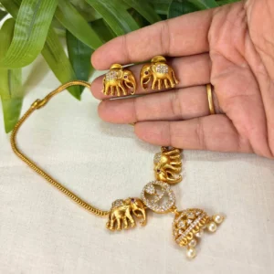 Antique Gold Finish Elephant Design Stone and Pearl Dropping Necklace – ADSN258 Antique Gold Finish Elephant Design Stone and Pearl Dropping Necklace - ADSN258