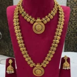 Antique Matt Finish Combo Set With Lakshmi Coin Design and Big Size Jhumka With Pink and Green Kemp Stone Perfect for Traditional and Function wear ADAC338.